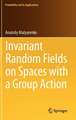 Invariant Random Fields on Spaces with a Group Action